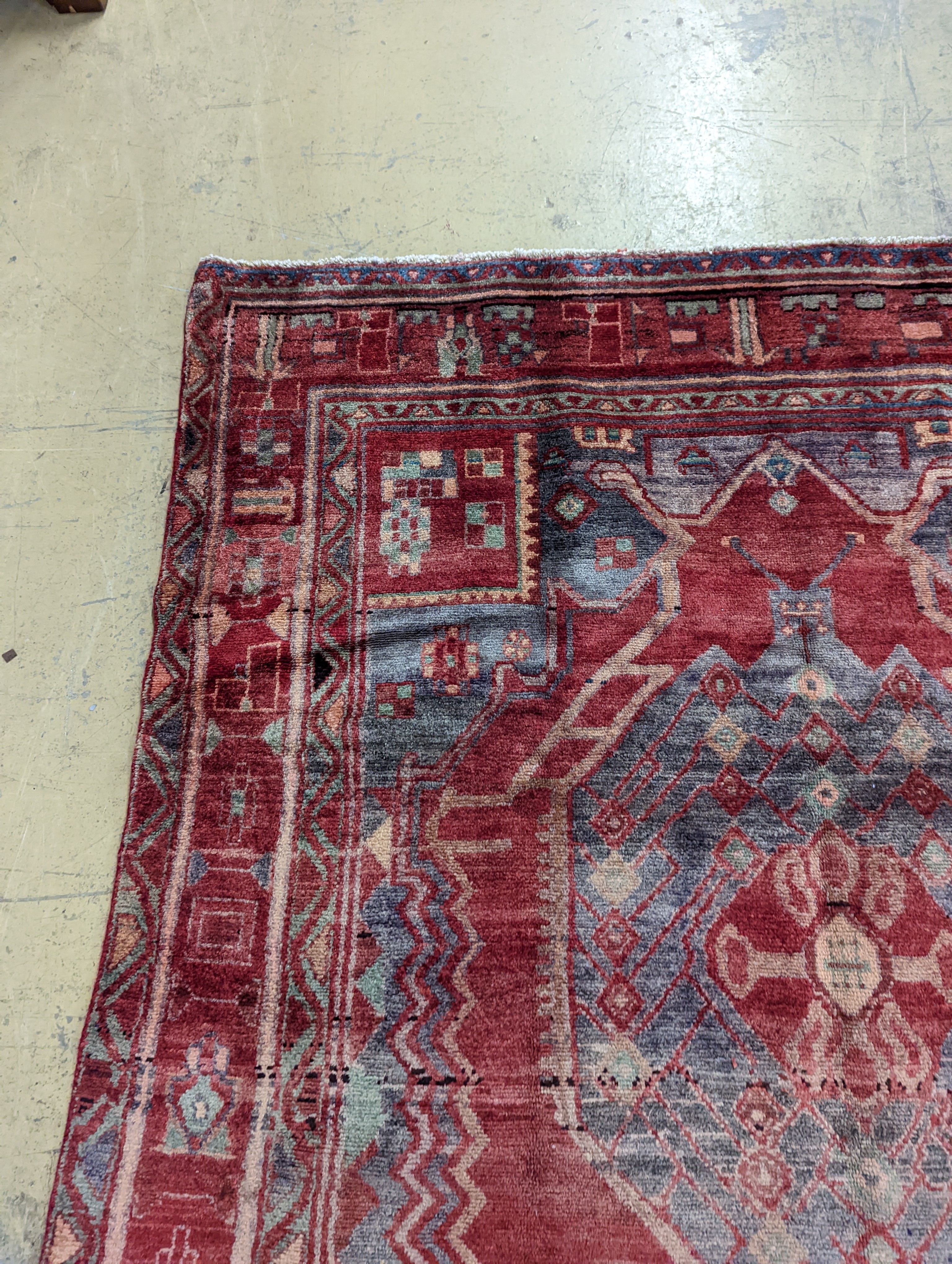 An Ardabil red ground carpet, 322 x 157cm
